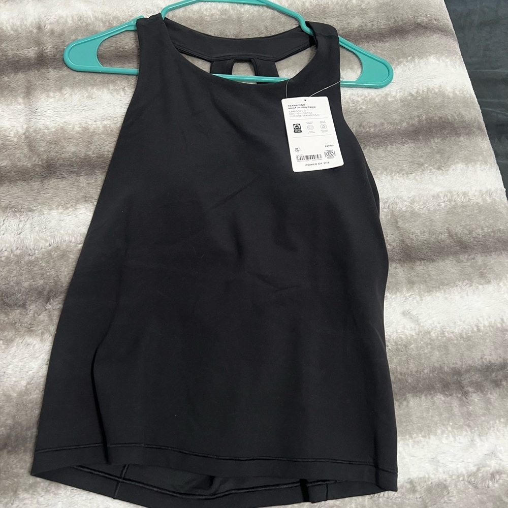 Brand new Athleta Tank with build in bra
Transcend Built in Bra Tank Black